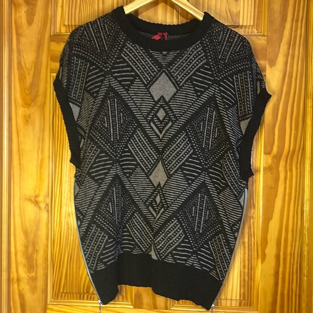 Love Scarlet Sweater Vest With Zippers on each side, soft and cozy material.
